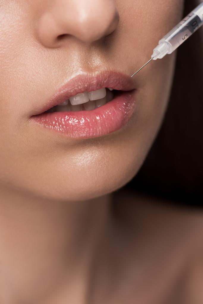 close up of woman making beauty injection into lips - Photo, Image