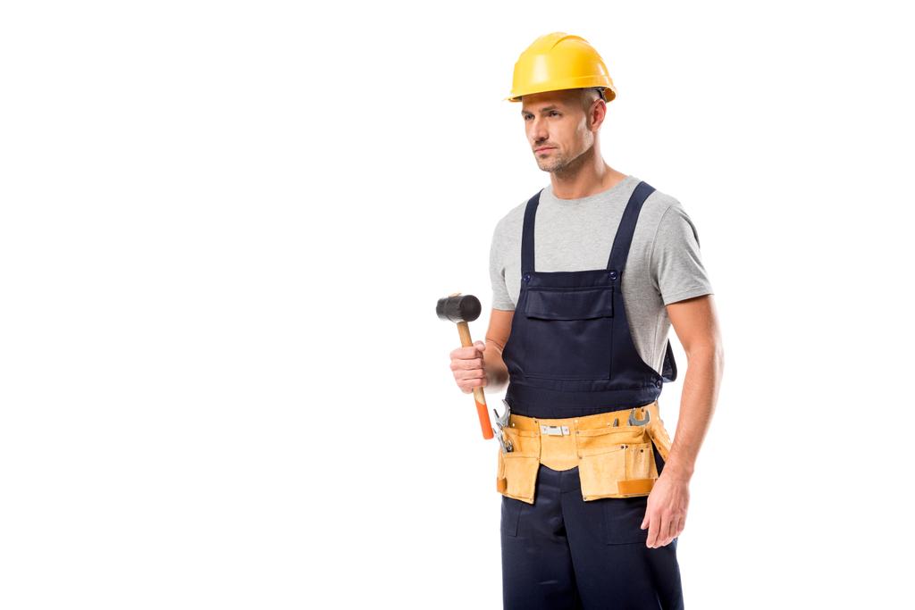 construction worker in tool belt holding hammer isolated on white - Photo, Image