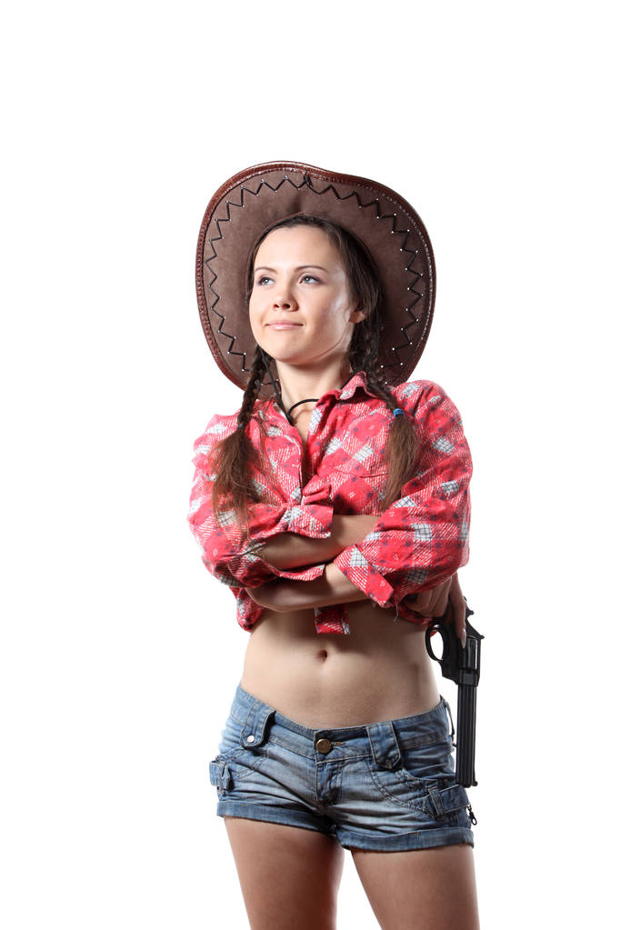 Mooie jonge meisje in de cowboy-hoed  - Foto, afbeelding