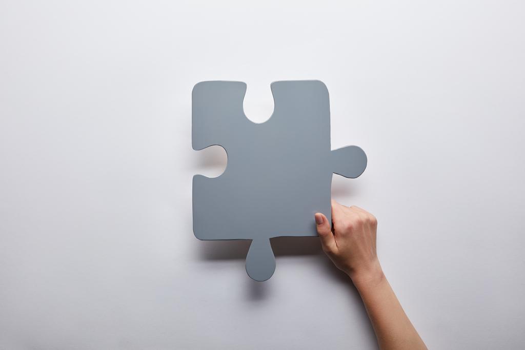 top view of grey puzzle problem solution symbol on grey background  - Photo, Image