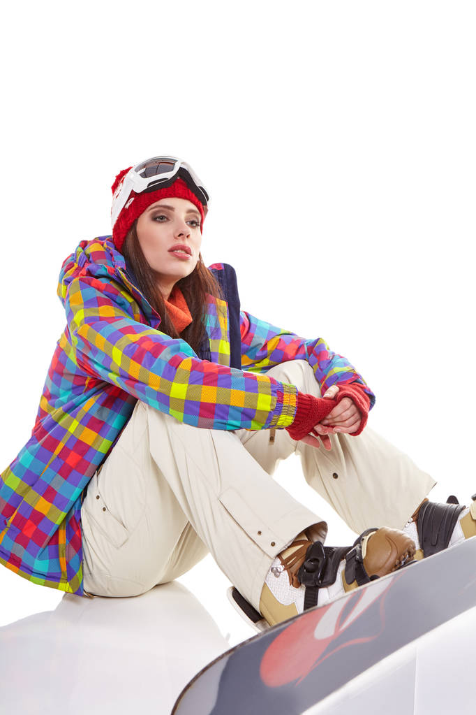 Uma mulher com um snowboard. Conceito de desporto de Inverno
 - Foto, Imagem