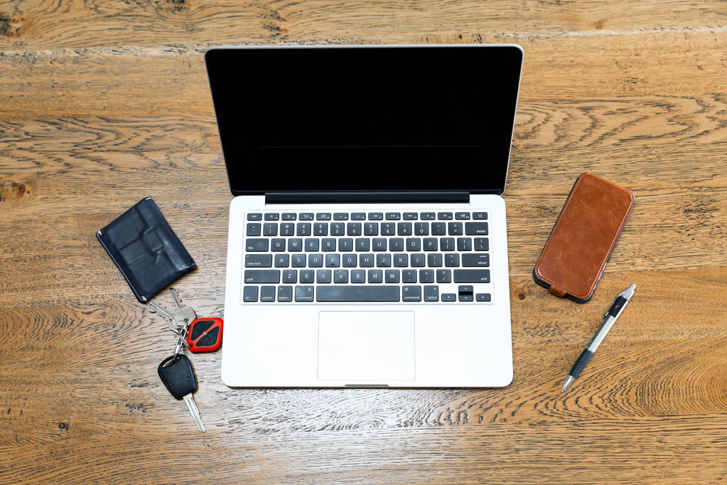 Laptop and other accessories on the desk - Photo, Image