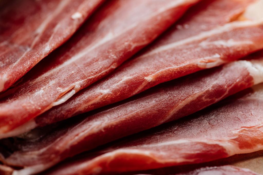 close up view of delicious thin sliced prosciutto - Photo, Image