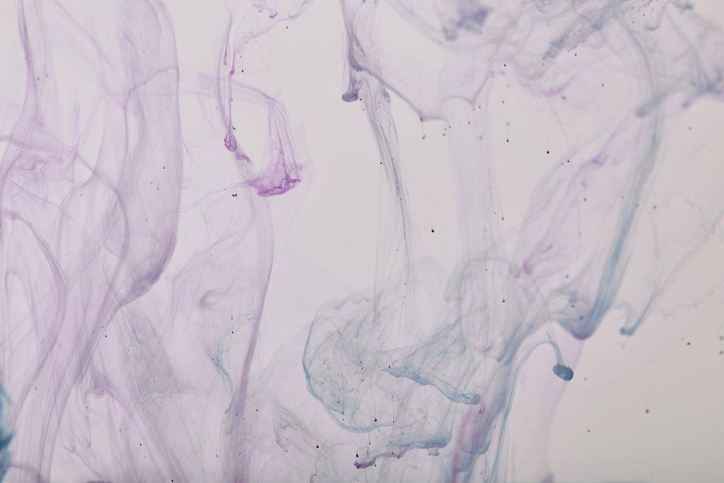 塗料の紫と青の渦と抽象的なパターン - 写真・画像