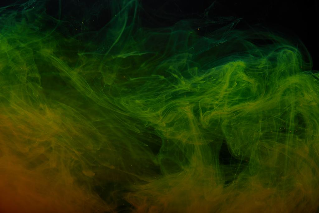 abstract background with green and orange swirls of paint  - Photo, Image