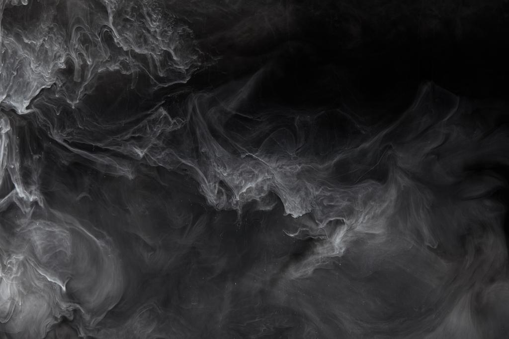 éclaboussure abstraite de peinture grise sur fond noir
 - Photo, image