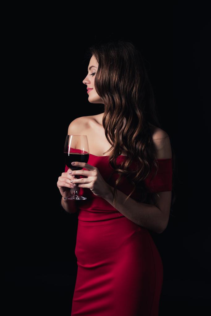 Foto e imagen de stock sin royalties de Hermosa Mujer En Vestido Rojo  Sosteniendo Copa