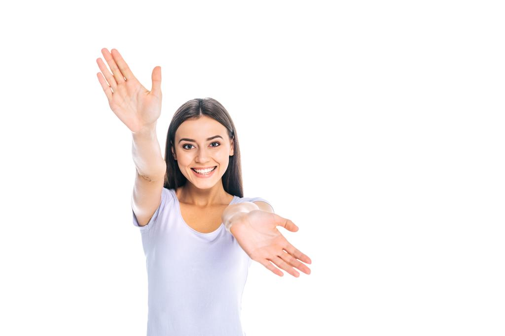Portret van lachende vrouw gebaren geïsoleerd op wit - Foto, afbeelding