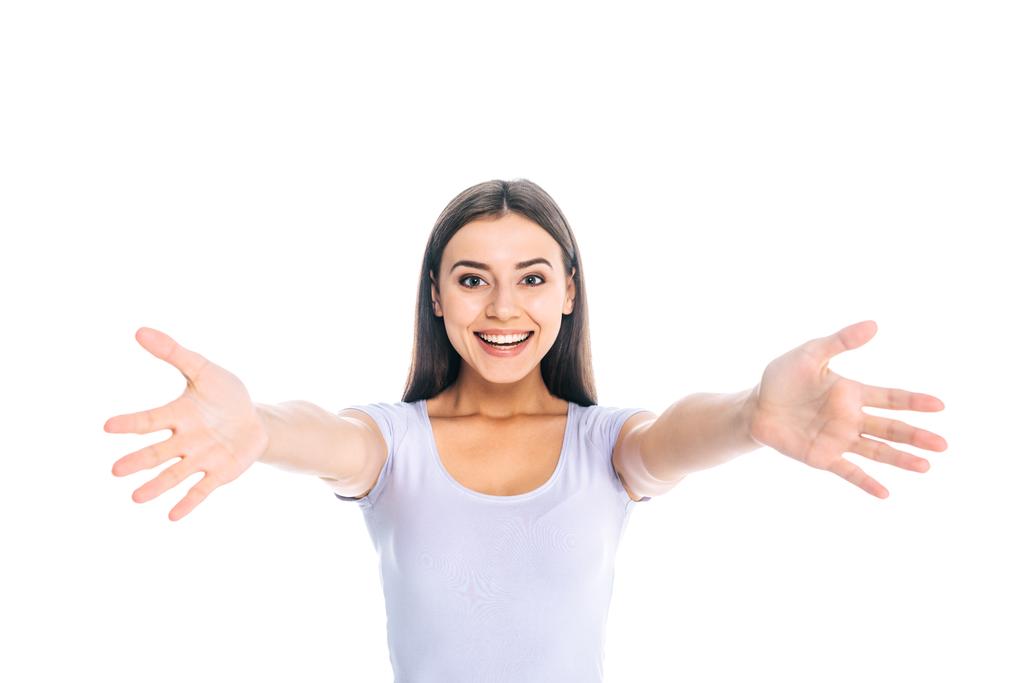 portrét šťastné mladé ženy s otevřenou náručí izolované na bílém - Fotografie, Obrázek