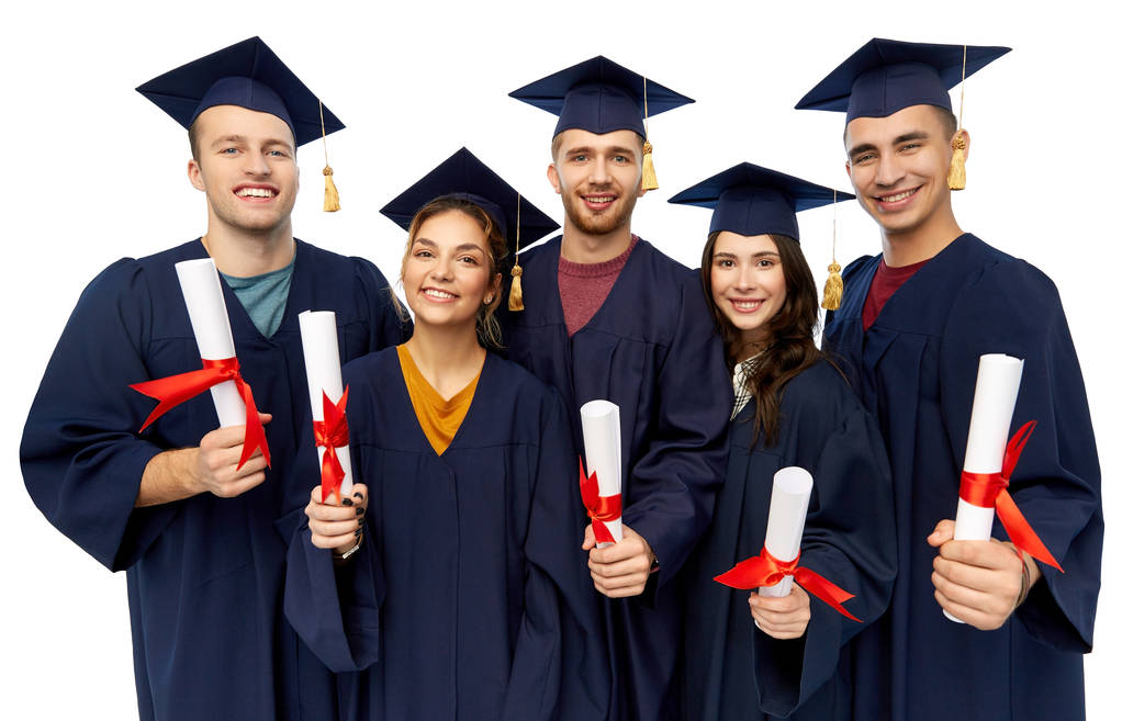 graduates in mortar boards with diplomas - Photo, Image