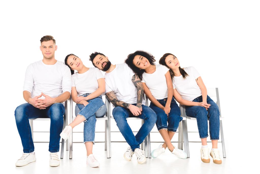multicultural group of young people lying on shoulders of each other isolated on white - Photo, Image