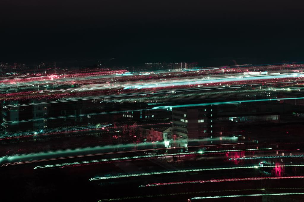 long exposure of night cityscape with defocused bright illumination - Photo, Image