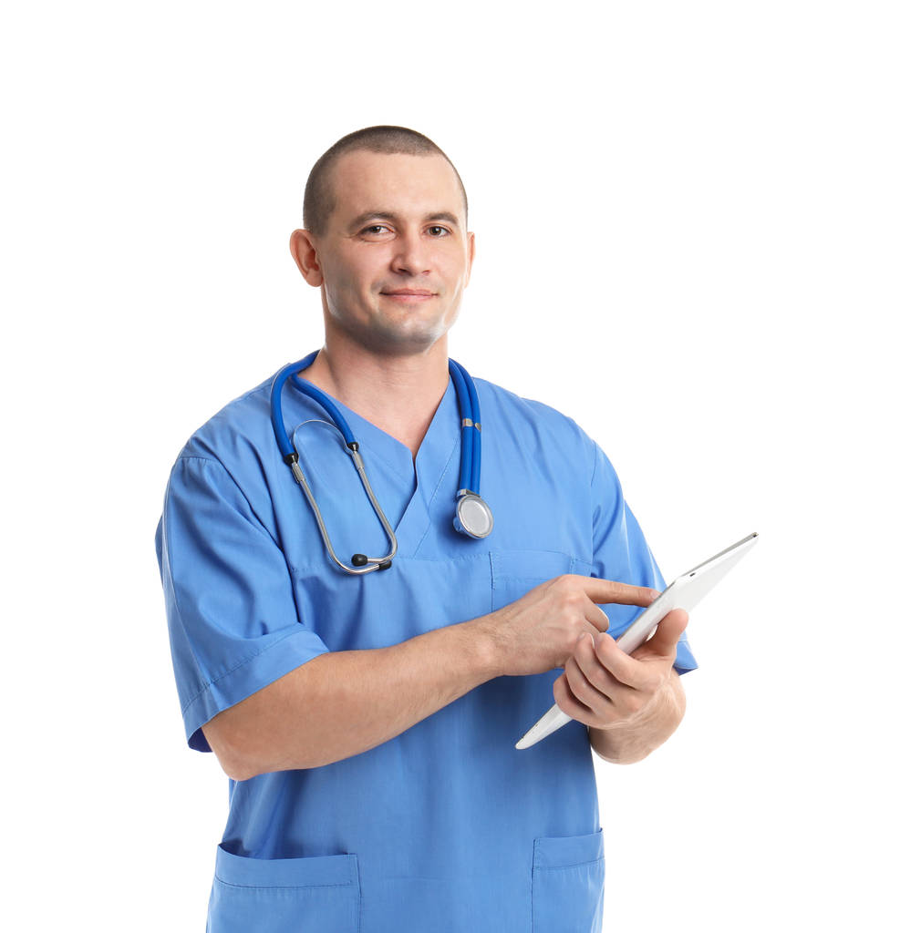 Portrait of medical assistant with stethoscope and tablet on white background - Photo, Image