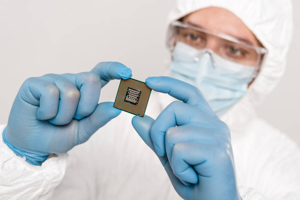 selective focus of microchip in hands of scientist wearing latex gloves isolated on grey - Photo, Image