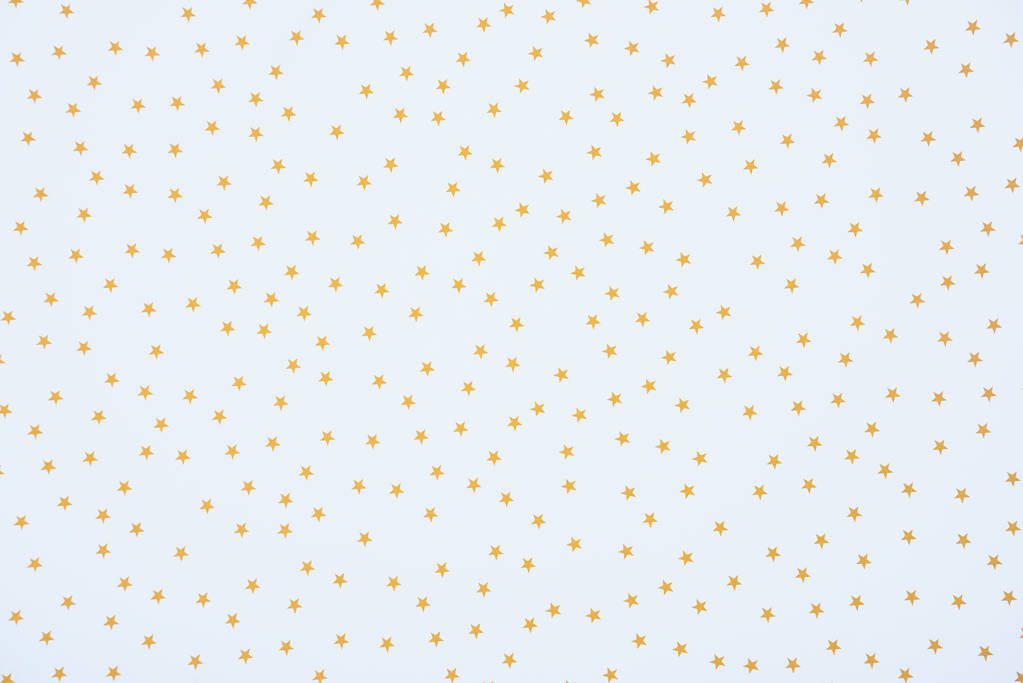 full frame image of festive paper decorated by golden stars background - Photo, Image