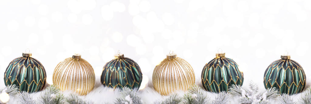 arranged green and golden christmas decorative balls, winter holidays concept - Photo, Image