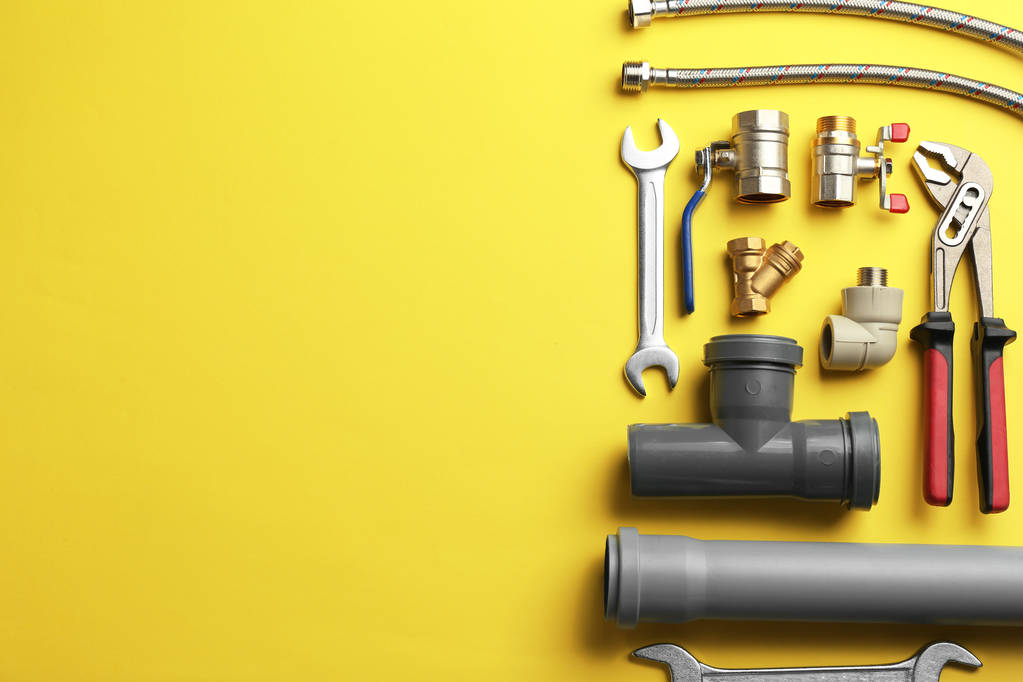 Flat lay composition with plumber's tools and space for text on color background - Photo, Image