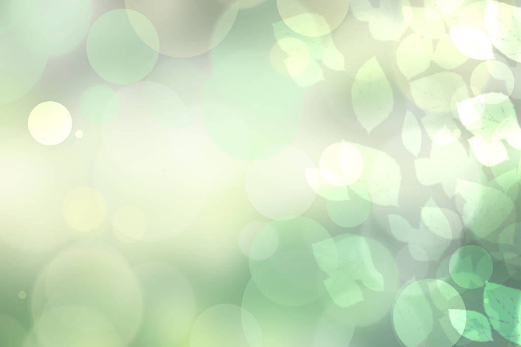 Sunny abstract bright green bokeh autumn background texture with leaves. Space for your design. - Photo, Image
