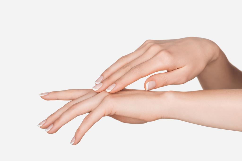 visão parcial de mãos femininas isoladas em branco
 - Foto, Imagem