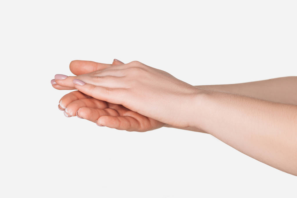 vista de cerca de las manos femeninas aisladas en blanco
 - Foto, imagen