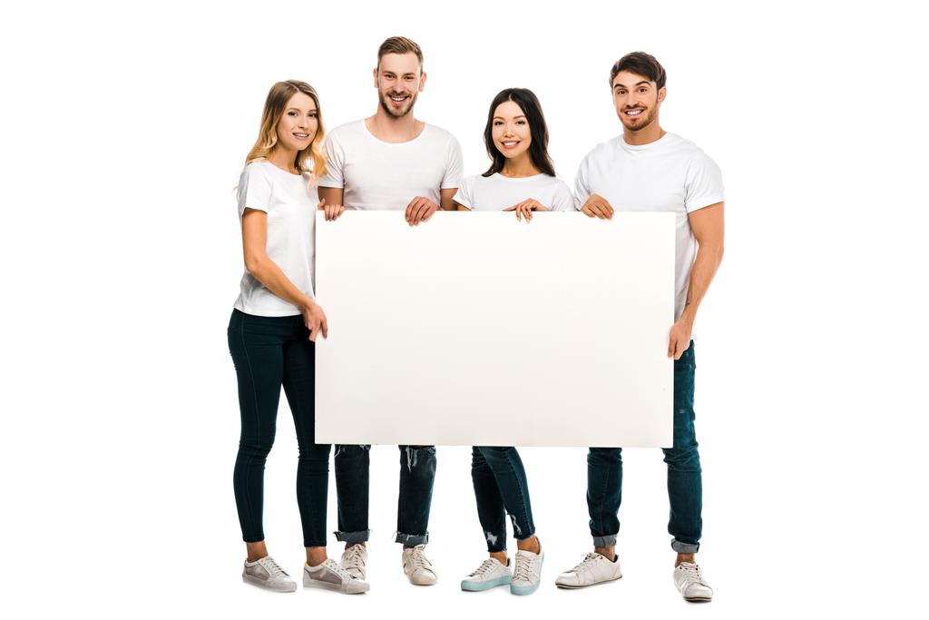 happy young people holding blank placard and smiling at camera isolated on white  - Photo, Image