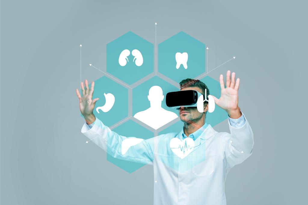 scientist in virtual reality headset touching medical interface in air isolated on grey, artificial intelligence concept - Photo, Image
