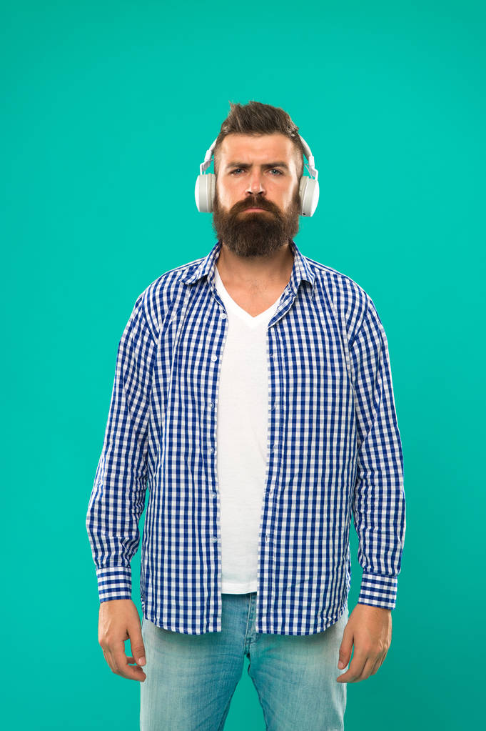 Excellent sound. Music library concept. Walking with music. Lifestyle urban citizen. Music always with me. Man listening music wireless headphones. Hipster wear modern technology gadget headphones - Photo, Image