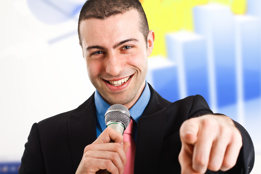 Man holding a microphone - Photo, Image