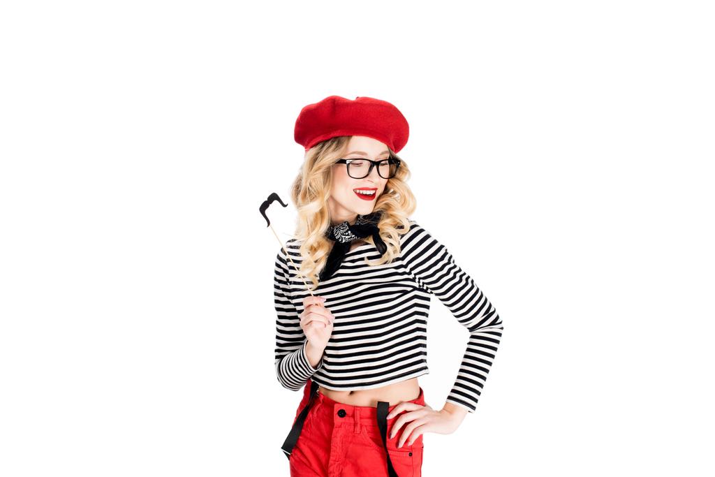 attractive blonde woman in glasses holding fake mustache on stick isolated on white  - Photo, Image