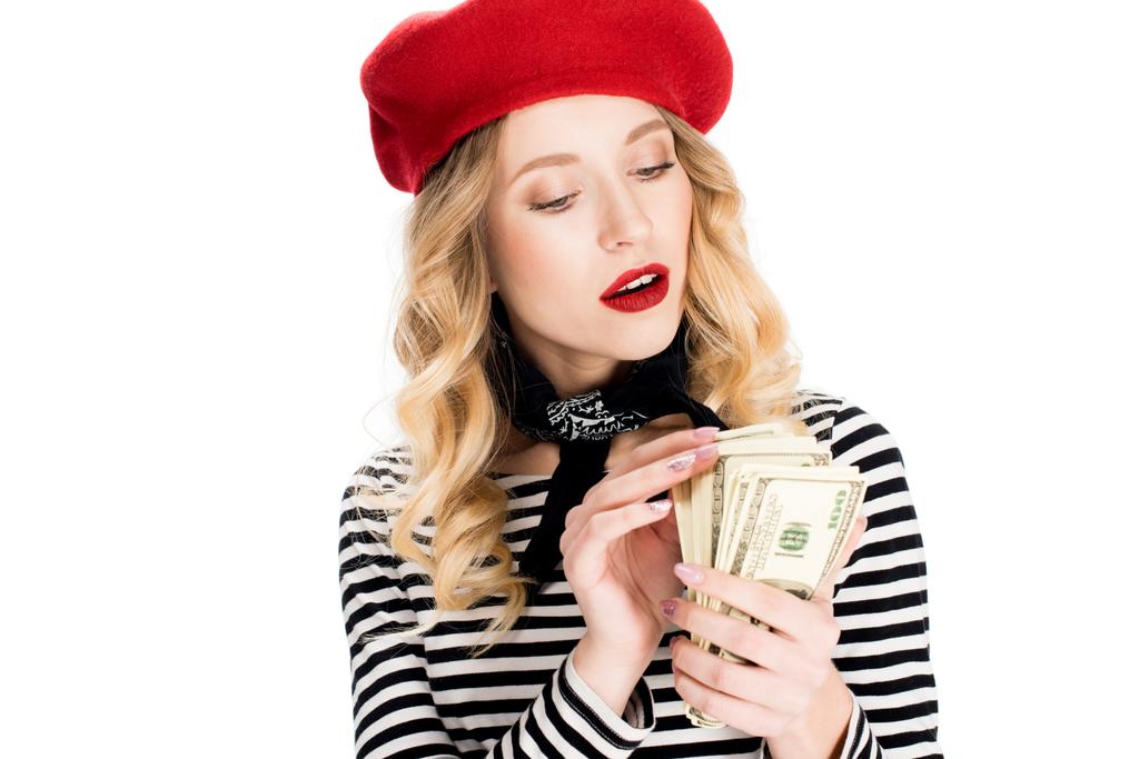 bella donna francese contando banconote in dollari isolate su bianco
  - Foto, immagini