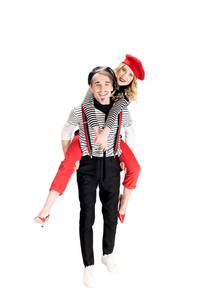 cheerful french man holding in arms happy girlfriend in red beret isolated on white  - Photo, Image