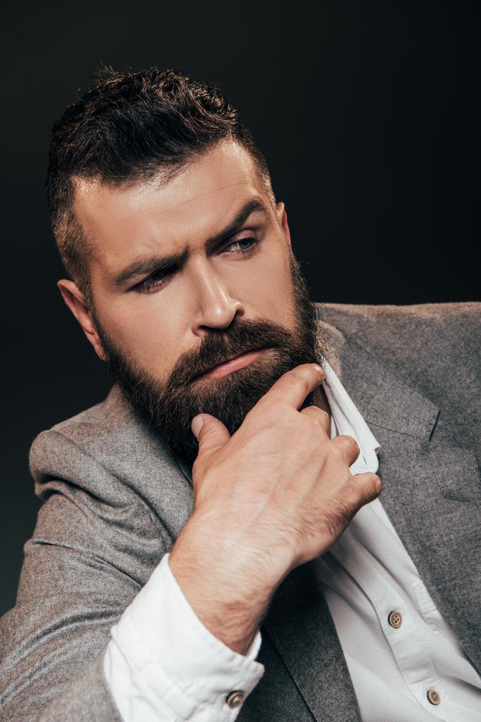 стохастична борода бізнесмен ізольована на коричневому
 - Фото, зображення