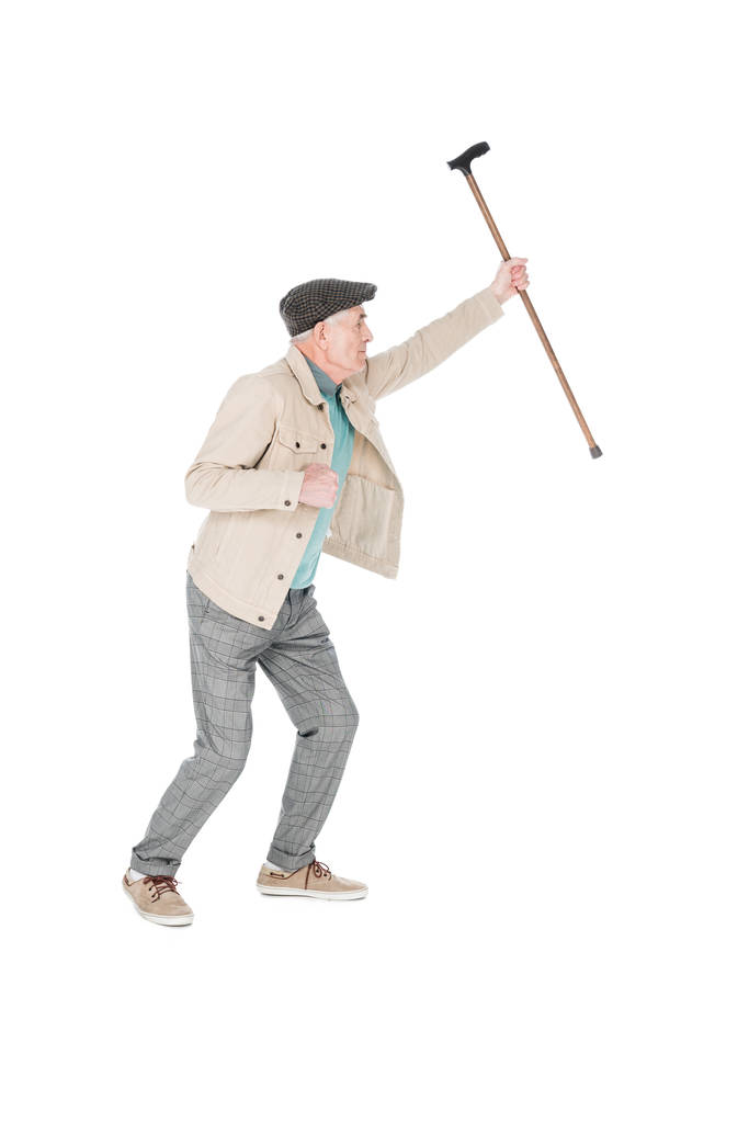 idősebb ember, aki wlking stick elszigetelt fehér feje fölött - Fotó, kép