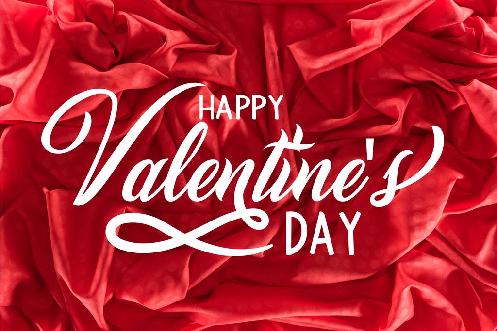 hermosa tela de seda roja con letras de "Feliz día de San Valentín"
 - Foto, Imagen