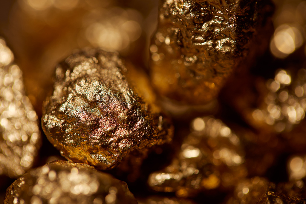 foco seletivo de pedras douradas com luzes cintilantes
 - Foto, Imagem