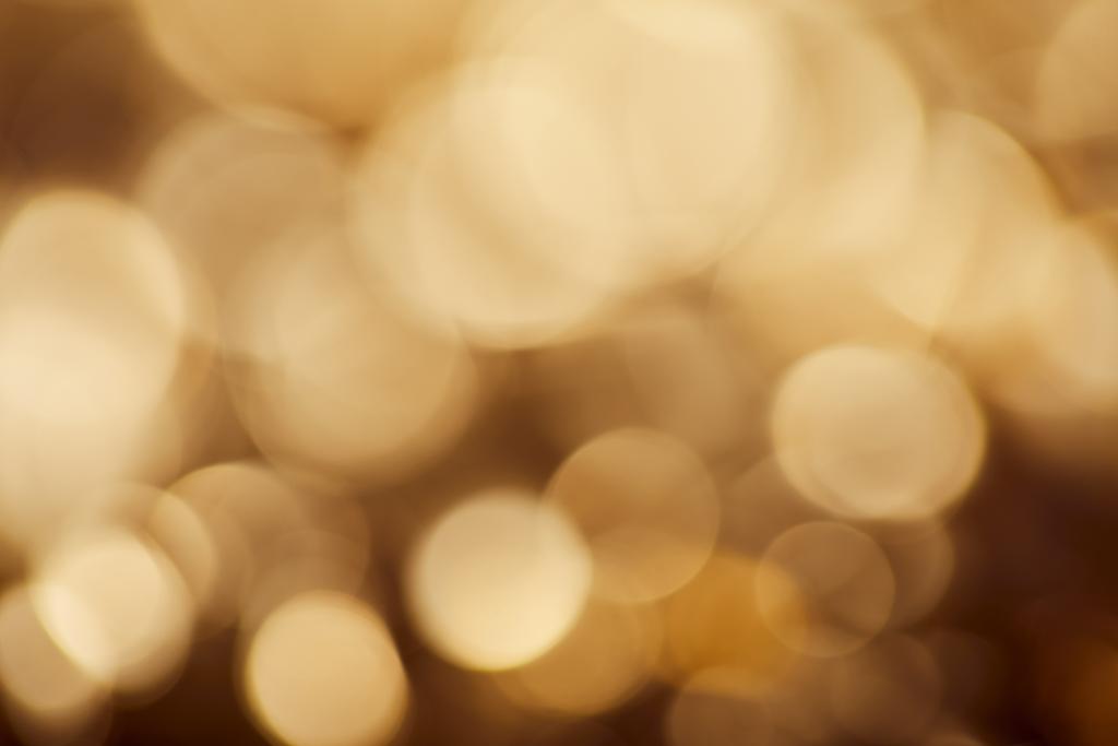 fond brun vif avec des lumières étincelantes dorées
 - Photo, image