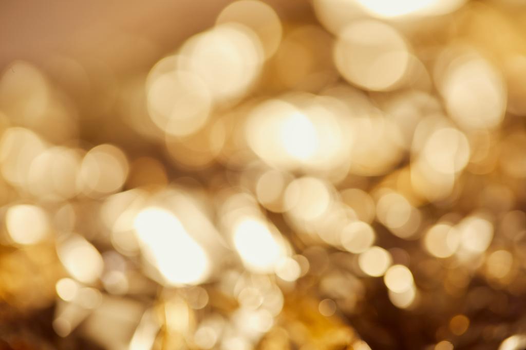 luzes cintilantes borradas brilhantes com fundo dourado
 - Foto, Imagem