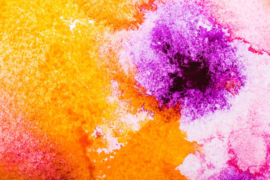 top view of orange, yellow and pink watercolor spills on white background  - Photo, Image