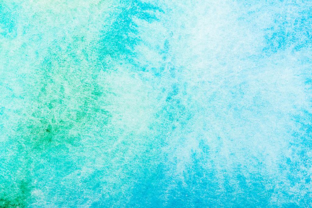 top view of turquoise watercolor spill with copy space  - Photo, Image