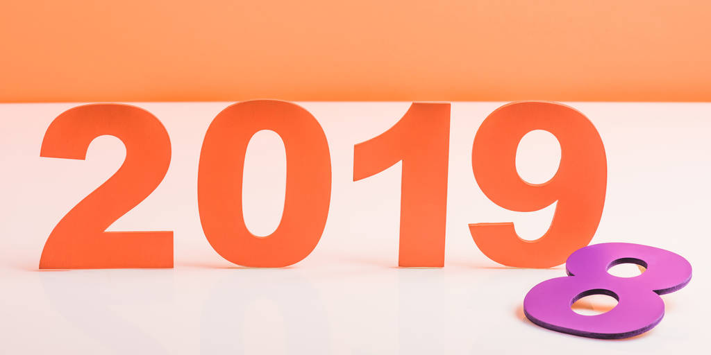 coral paper cut 2019 numbers and violet number 8 on white surface, color of 2019 concept - Photo, Image