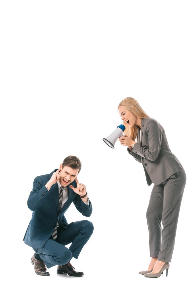 angry female boss yelling into megaphone at stressed businessman isolated on white - Photo, Image