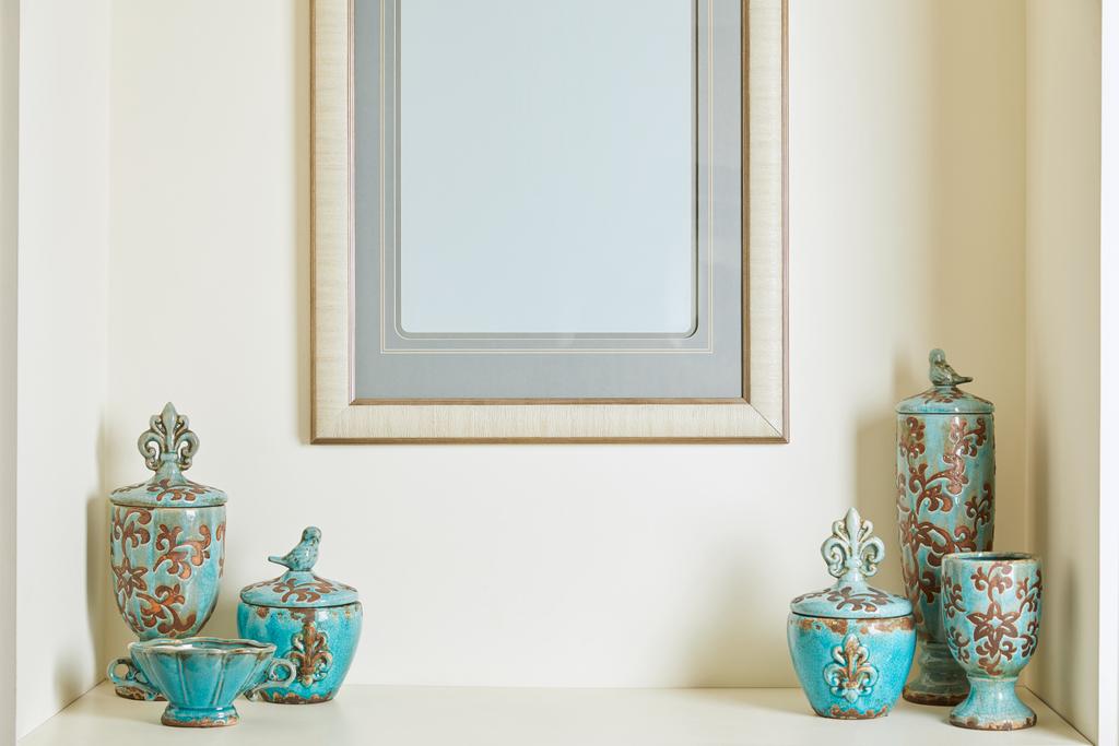  picture frame and turquoise set on shelf  - Photo, Image