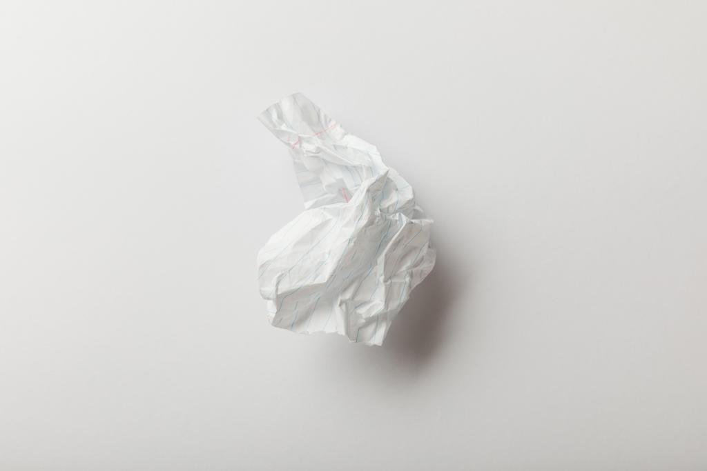 top view of white crumpled page on white background - Photo, Image