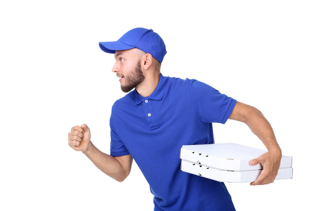 Levering man met pizza in kartonnen dozen geïsoleerd op witte achtergrond - Foto, afbeelding