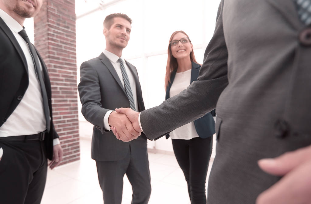 Business shaking hands in the office - Photo, Image