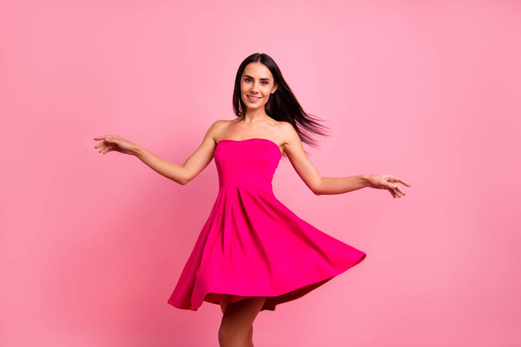 Close up photo attractive cute she her lady spring romance spinning whirling hair dress flight round blow smiling wearing bright classy chic vivid pink formal-wear outfit isolated on rose background - Photo, Image
