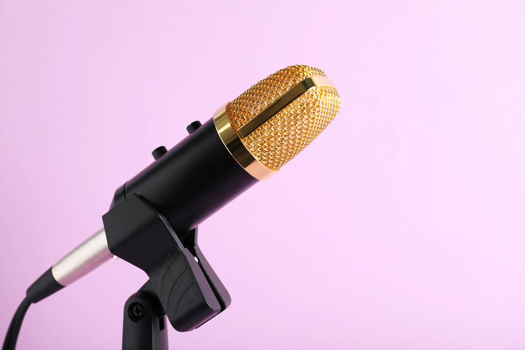 Condenser microphone on color background, space for text - Photo, Image