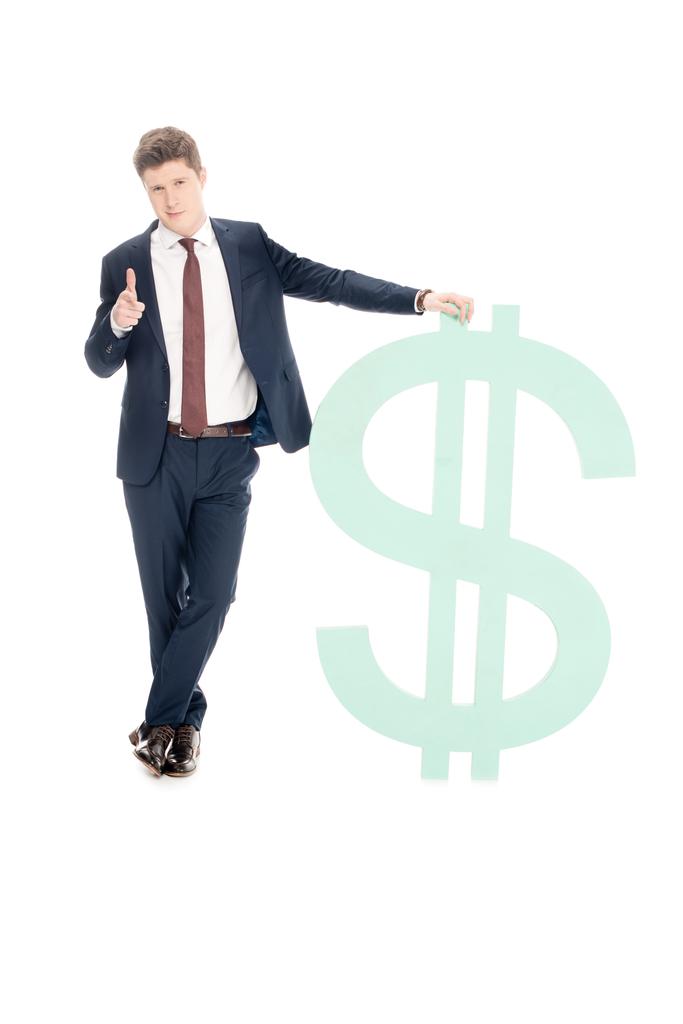успешный молодой бизнесмен с большим знаком доллара указывая на вас изолированы на белом
 - Фото, изображение