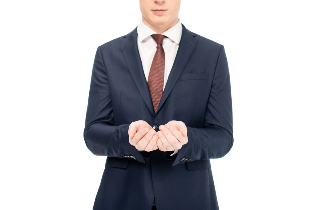 cropped view of businessman holding something in palms isolated on white - Photo, Image