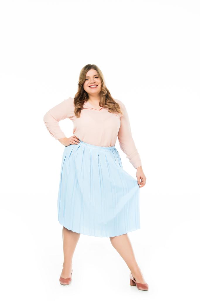 happy elegant overweight woman holding skirt isolated on white - Photo, Image